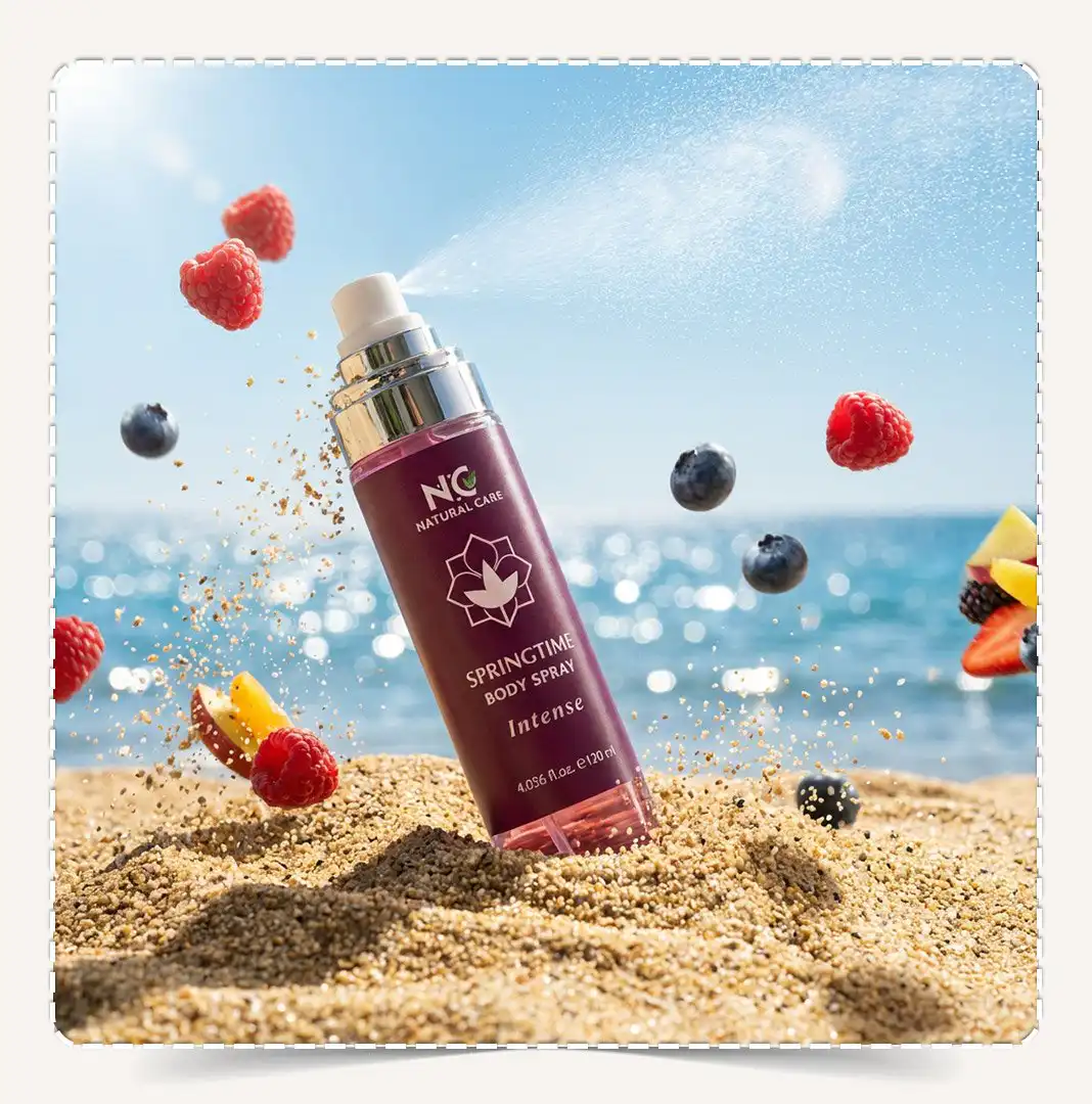 معطر الجسم سبرينج تايم مدفون في رمال الشاطئ مع توت متطاير وفواكه ورذاذ.