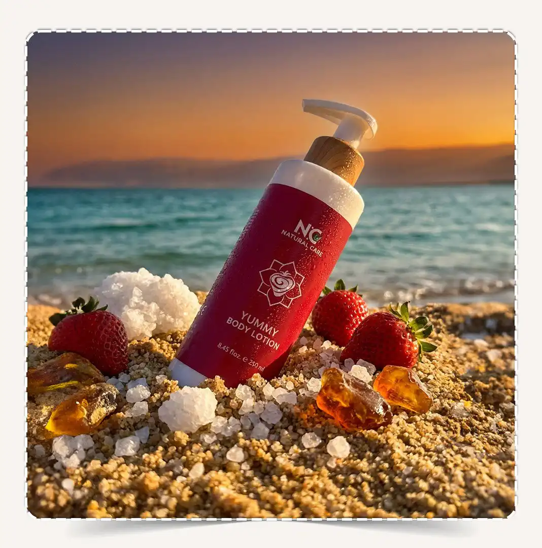 لوشن الجسم يمي Yummy Body Lotion مدفون في رمال شاطئ البحر الميت مع الفراولة والعنبر.